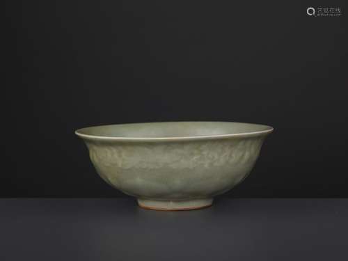 A CARVED LONQUAN LOTUS BOWL, MING