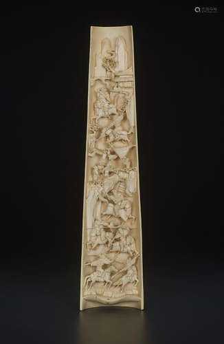 A CARVED IVORY WRIST REST, QING