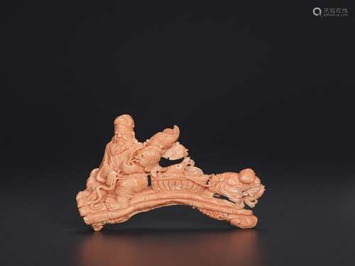 A CORAL CARVING, 20TH CENTURY