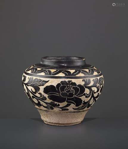 A SMALL CARVED CIZHOU JAR, JIN