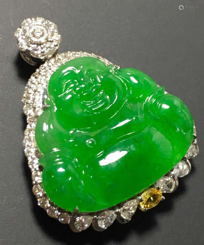 A GREEN JADEITE CARVED BUDDHA PENDANT, TYPE A