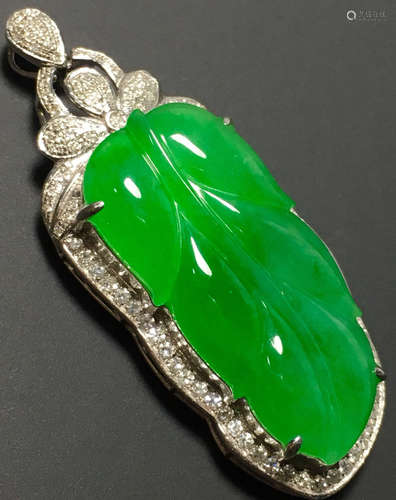 A GREEN JADEITE CARVED LEAF PENDANT, TYPE A