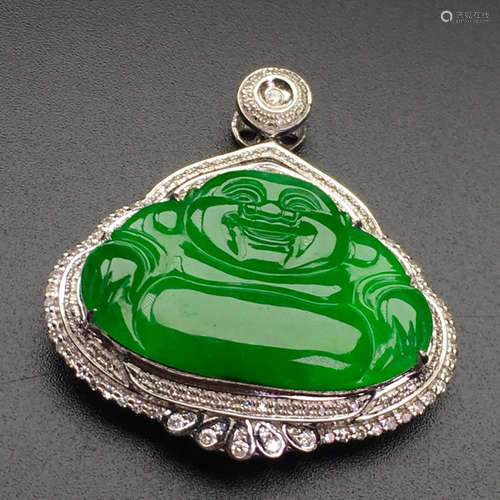 A GREEN JADEITE CARVED BUDDHA PENDANT