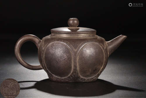 A ZISHA LOTUS PATTERN TEAPOT