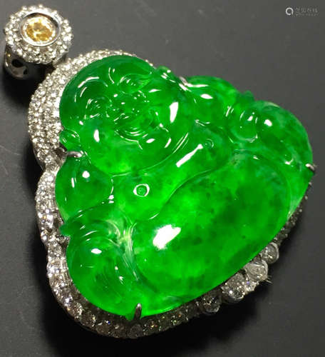 A GREEN JADEITE CARVED BUDDHA PENDANT, TYPE A