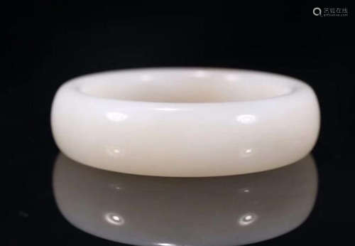 A HETIAN WHITE JADE CARVED BANGLE