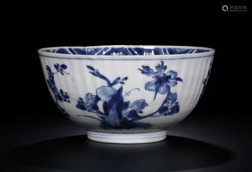 A WHITE AND BLUE GLAZE CASTED FLORAL PATTERN BOWL