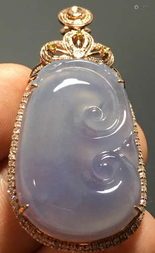 A PURPLE JADEITE CARVED AUSPICIOUS PENDANT, TYPE A