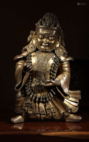 A GILT BRONZE CASTED KINGKA BUDDHA