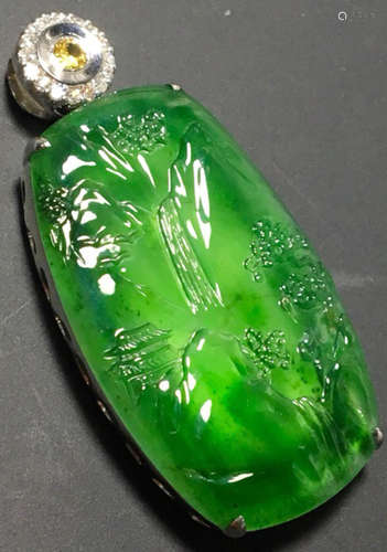 A GREEN JADEITE CARVED LANDSCAPE PENDANT, TYPE A