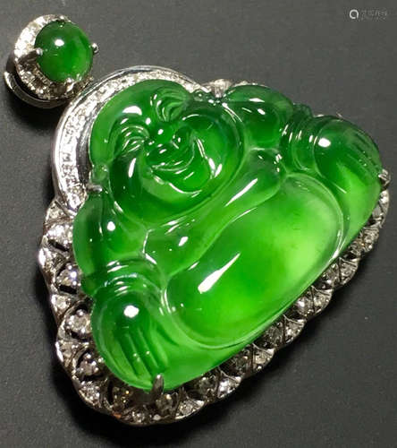 A GREEN JADEITE CARVED BUDDHA PENDANT, TYPE A