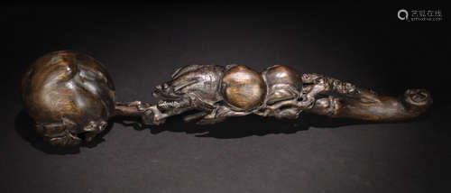 A CHENXIANG WOOD CARVED AUSPICIOUS SHAPED RUYI