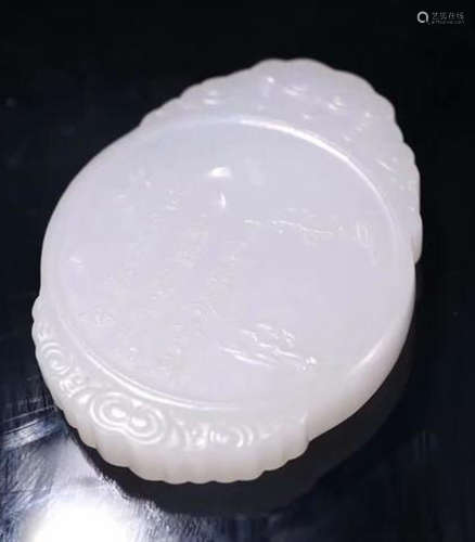 A HETIAN JADE CARVED LANDSCAPE PATTERN PENDANT