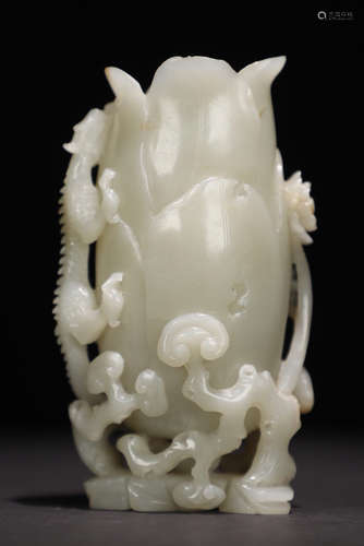 A HETIAN JADE CARVED BEAST PATTERN VASE