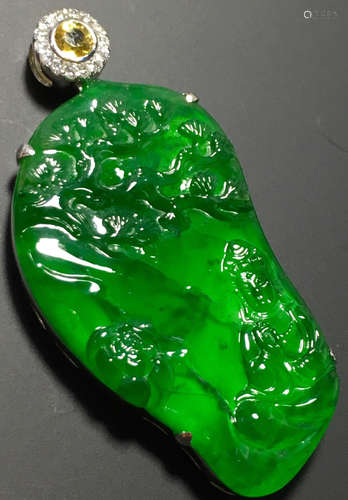 A GREEN JADEITE CARVED LANDSCAPE PENDANT, TYPE A