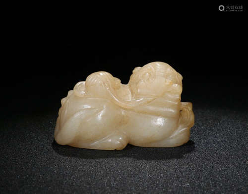 A HETIAN JADE ORNAMENT OF LION