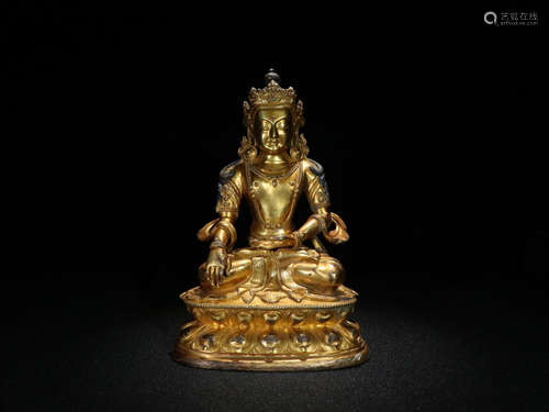 A GILT BRONZE BUDDHA