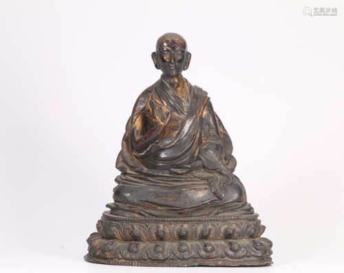 A TIBET STYLE GILTED BRONZE BUDDHA