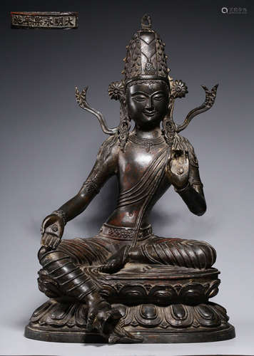 A BRONZE FIGURE OF BUDDHA