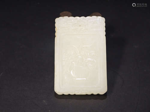 A SINJIANG WHITE HETIAN JADE TABLET OF FLOWER