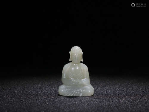 A HETIAN JADE BUDDHA FIGURE