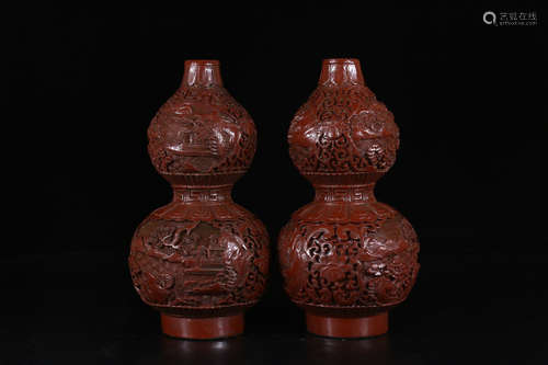 A PAIR OF LACQUER WOOD GOURD ORNAMENTS