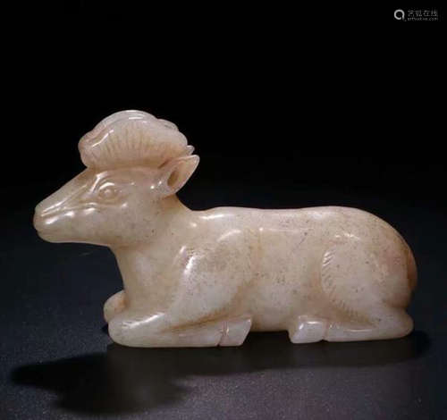 A HETIAN JADE GOAT FIGURE