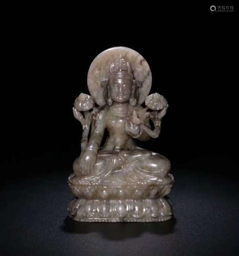 A HETIAN JADE FIGURE OF THE KNOWLEDGEABLE MANJUSRI