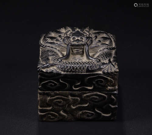 A BLACK STONE DRAGON PATTERN BOX