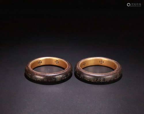 A PAIR OF CHENXIANG WOOD GILTED SILVER 