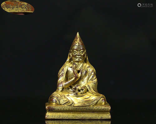 A GILT BRONZE BUDDHA