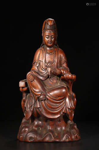 A CHENXIANG WOOD GUANYIN ORNAMENT