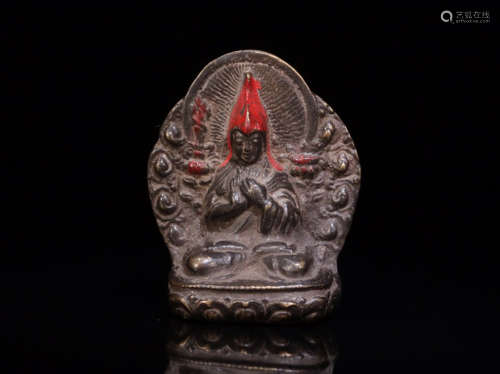 A BRONZE BUDDHA FIGURE