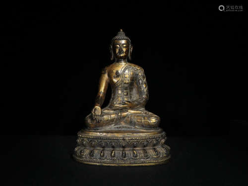 A GILT BRONZE BUDDHA