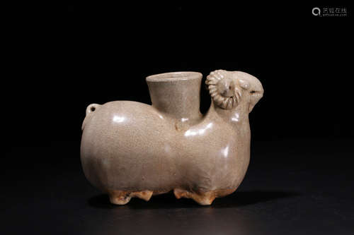 A YUE YAO GREEN GLAZE SHEEP SHAPED PENDANT