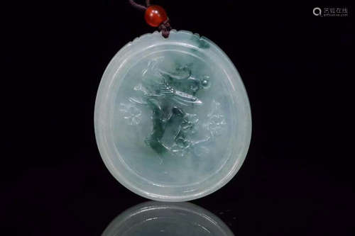 A JADEITE CARVED BIRD PATTERN CIRCLE PENDANT