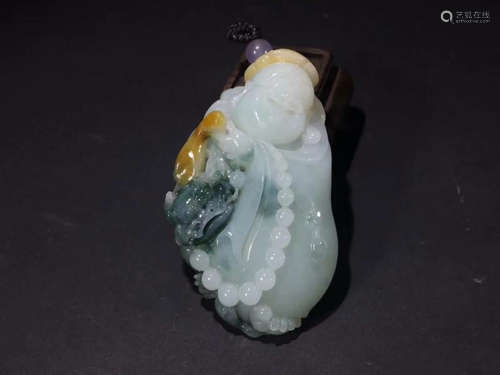 A JADEITE CARVED MAITREYA BUDDHA PENDANT