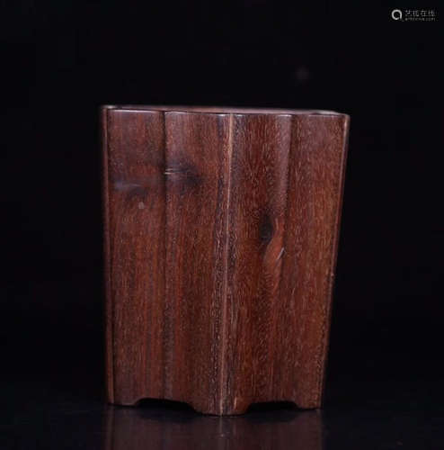 A HUANGHUALI WOOD CARVED HEXAGON PEN HOLDER