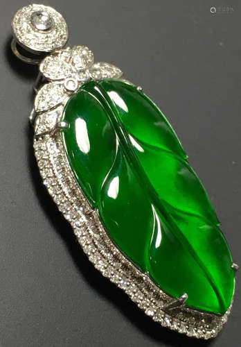 A GREEN JADEITE CARVED LEAF PENDANT, TYPE A