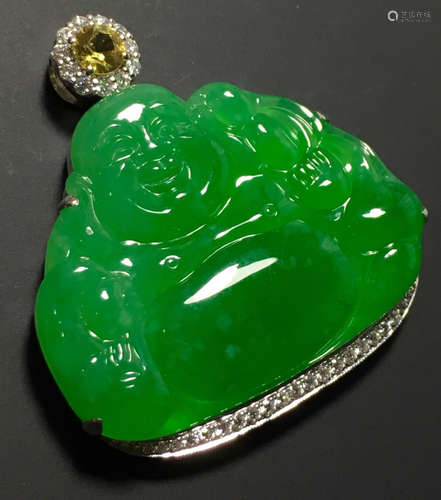 A GREEN JADEITE CARVED BUDDHA PENDANT, TYPE A