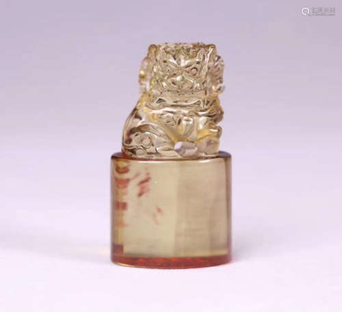 A CRYSTAL CASTED LION SHAPED SEAL
