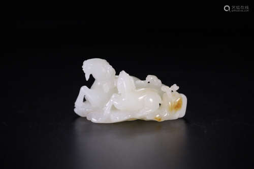 A HETIAN JADE CARVED SHEEP SHAPED PENDANT