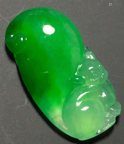 A GREEN JADEITE CARVED SQUIRREL PENDANT, TYPE A