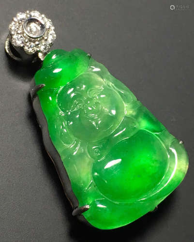 A GREEN JADEITE CARVED BUDDHA PENDANT, TYPE A