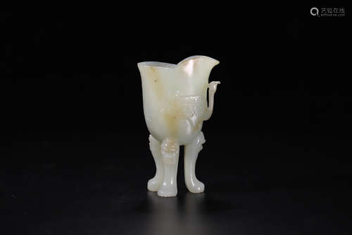 A HETIAN JADE CARVED PHOENIX PATTERN TRIPOD CUP