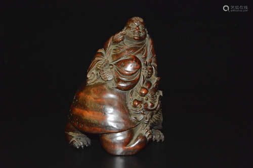 A BAMBOO CARVED MAITREYA BUDDHA