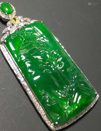 A GREEN JADEITE CARVED LANDSCAPE PENDANT, TYPE A