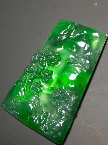 A GREEN JADEITE CARVED LANDSCAPE PENDANT, TYPE A