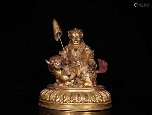 A GILT BRONZE CASTED WEALTH BUDDHA