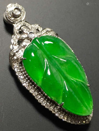 A GREEN JADEITE CARVED LEAF PENDANT, TYPE A